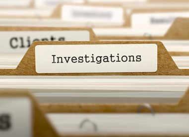 Folders of criminal and civil investigations in Victorville, CA.